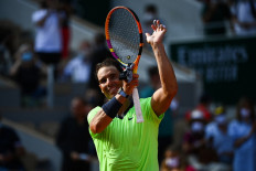 Spain's Rafael Nadal celebrates after winning against Argentina's Diego Schwartzman during their men's singles quarter-final tennis match on Day 11 of The Roland Garros 2021 French Open tennis tournament in Paris on June 9, 2021.