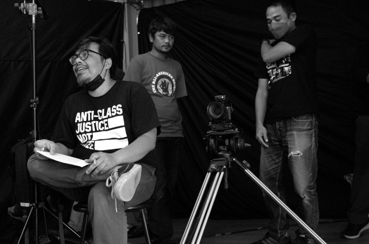 The director: The documentary is directed by filmmaker, musician and writer Alvin Yunata (far left).