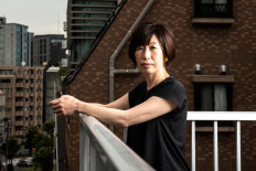 This photo taken on June 7, 2021 shows Kimiko Hirata, the international director of the Japan-based nonprofit Kiko Network, posing during an interview in Tokyo. Hirata has spent nearly half her life fighting to wean Japan off its dependence on coal.