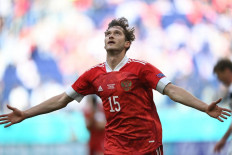 Russia's forward Aleksey Miranchuk celebrates scoring the opening goal during the UEFA EURO 2020 Group B football match between Finland and Russia at the Saint Petersburg Stadium in Saint Petersburg on June 16, 2021.
