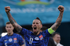 Slovakia's midfielder Marek Hamsik celebrates after winning the the UEFA EURO 2020 Group E football match between Poland and Slovakia at the Saint Petersburg Stadium in Saint Petersburg on June 14, 2021.