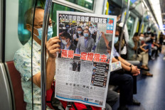 Hong Kong pro-democracy paper unable to pay staff after asset freeze: aide