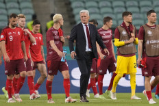 Switzerland's Bosnian-Swiss coach Vladimir Petkovic (center) and his players celebrate after the UEFA EURO 2020 Group A football match between Switzerland and Turkey at the Olympic Stadium in Baku on June 20, 2021.
