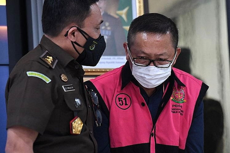 Illegal logging convict Adelin Lis appears in a press conference at the Attorney General’s Office on June 19, 2021. State prosecutors repatriated the fugitive from Singapore after he fled Indonesia in 2008.