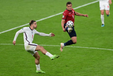 Czech Republic's midfielder Tomas Holes and England's midfielder Jack Grealish (left) vie for the ball during the UEFA EURO 2020 Group D football match between Czech Republic and England at Wembley Stadium in London on June 22, 2021. 