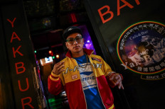 'Godfather' of Tibetan rap spits karmic rhymes
