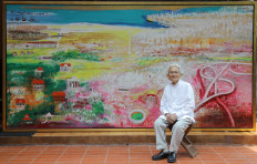 Colorful Indonesia: Srihadi Soedarsono in front of his latest work, Jayakarta: the Glory of the Past, Present and Future.