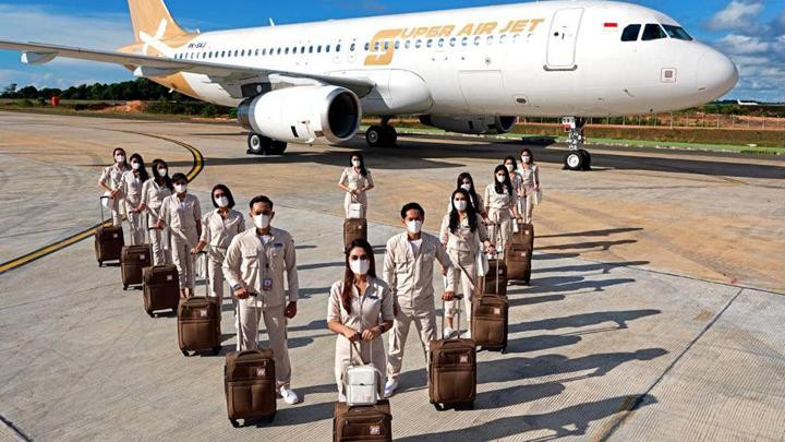 Super Air Jet airplane and the airline crew