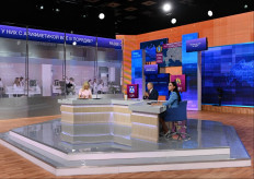 Russian President Vladimir Putin (center) takes part in an annual televised phone-in with the country's citizens dubbed 