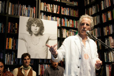The former drummer of the band The Doors John Densmore introduces a group of friends and musician in Hollywood 08 November 2006, during an event celebrating 40 years of "The Doors" legacy. The event took place in Sunset Boulevard's Book Soup where The Doors lead singer Jim Morrison introduced his first pieces of poetry that later became lyrics for the band's songs (AFP/Hector Mata).
Usage: 0