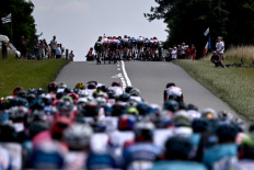 The pack rides separated in two groups during the 7th stage of the 108th edition of the Tour de France cycling race, 249 km between Vierzon and Le Creusot, on July 02, 2021.
