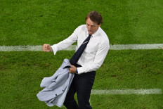Italy's coach Roberto Mancini reacts at the end of the UEFA EURO 2020 quarter-final football match between Belgium and Italy at the Allianz Arena in Munich on July 2, 2021. 