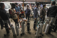 Self-isolation patients scramble for help amid Indonesia’s second COVID-19 wave