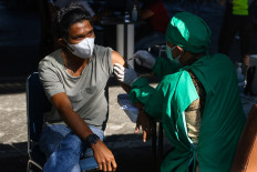 Indonesia scales up vaccine deals, rollout amid devastating 'second wave'