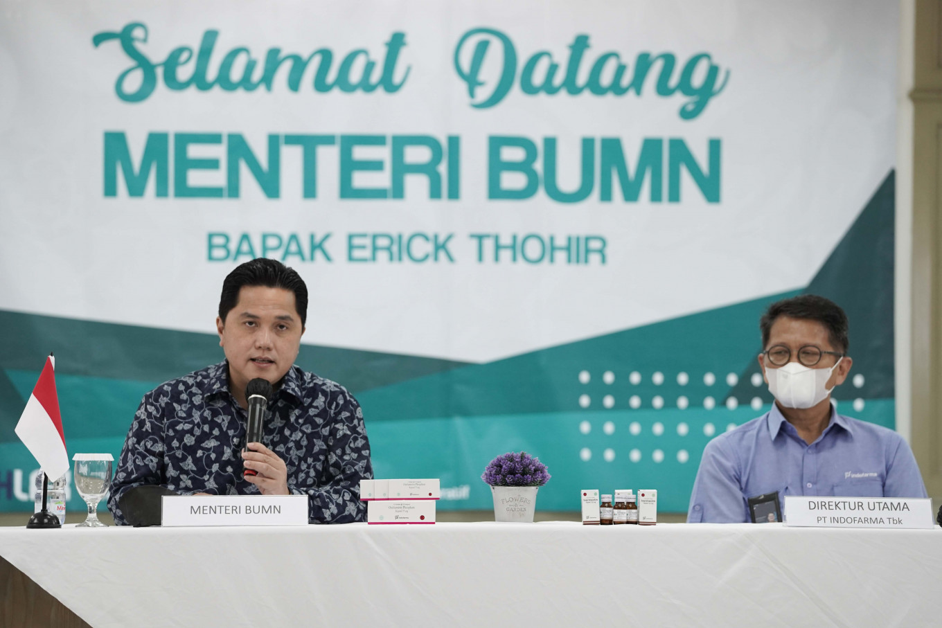 State-Owned Enterprises (SOEs) Minister  Erick Thohir (left) speaks during a visit on June 21, 2021 to PT Indofarma's manufacturing facility in West Cikarang, Bekasi, West Java. The state-owned pharmaceutical company started producing ivermectin to meet a sudden rise in demand for the antiparasitic amid Indonesia's "second wave" of COVID-19. 