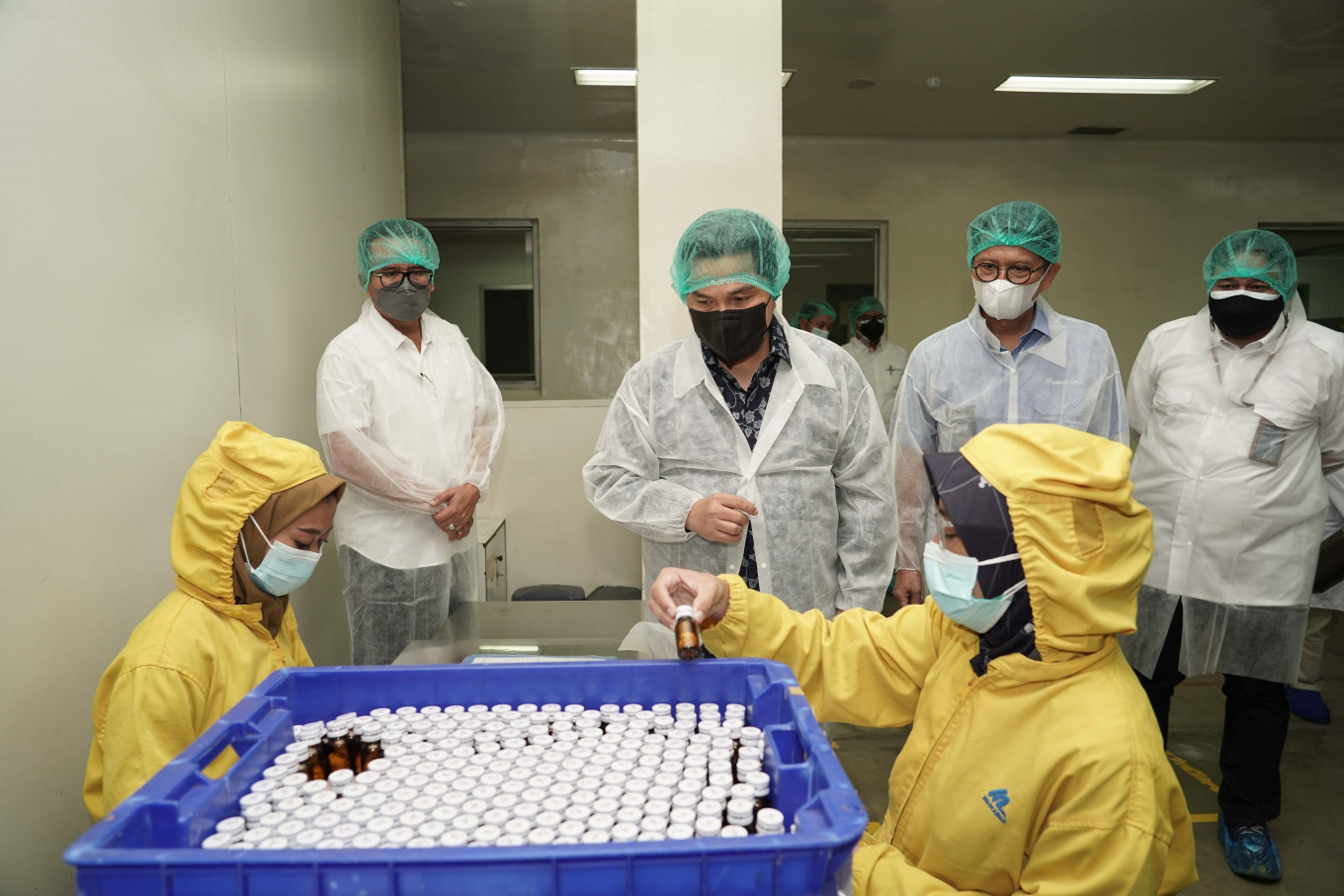 State-owned Enterprises (SOEs) Minister Erick Thohir visits state-owned pharmaceutical company PT Indofarma on June 21, 2021, as the company started producing Ivermectin to meet COVID-19 drug demand in West Cikarang, Bekasi, West Java. 