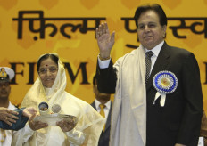In this file photo taken on September 03, 2008 India's President Pratibha Patil (L) presents The Life Time Achievement award to Bollywood actor Dilip Kumar (R) at the 54th National Film Awards Function in New Delhi.