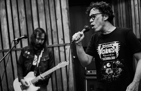 Still rocking: Jimi Multhazam (R) with one of his bands, Morfem, during band rehearsals. Jimi became popular as the singer of the influential new wave band The Upstairs. 