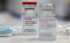 A vial of the Moderna COVID-19 vaccine is seen at a clinic in Aschaffenburg, Germany on Jan. 15, 2021.