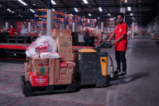 Good business: An employee prepares deliveries at an online shop’s warehouse in Jakarta. Indonesia is the 11th-largest market for e-commerce in the world, with a revenue of US$30 billion last year.