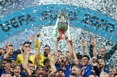 Italy celebrate with the trophy after winning Euro 2020 at Wembley Stadium, London, UK, on July 11, 2021.