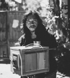 Portrait of the artist: I Gusti Agung Wijaya Utama poses with an Afghan box camera.