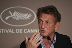 US actor and director Sean Penn speaks during a press conference for the film "Flag Day" at the 74th edition of the Cannes Film Festival in Cannes, southern France, on July 11, 2021.
