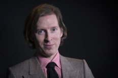 In this file photo taken on April 3, 2018 US film director Wes Anderson poses in Paris. Self-obsessed guys with daddy issues, maps, models and handwritten letters, probably some 1960s rock and definitely Bill Murray being deadpan -- you know immediately whose universe you're in. Wes Anderson returns with his 10th feature, 
