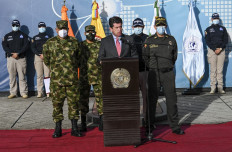 Colombian Defence Minister Diego Molano (center), General Commander of the Military Forces of Colombia, Luis Fernando Navarro Jimenez (left) and Police director Jorge Luis Vargas Valencia deliver a press conference in Bogota, on July 12, 2021. 