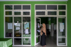 Delta variant overwhelms Indonesia’s beleaguered Puskesmas