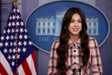 Pop music star and Disney actress Olivia Rodrigo makes a brief statement to reporters at the beginning of the daily news conference in the Brady Press Briefing Room at the White House on July 14, 2021 in Washington, DC. Rodrigo is partnering with the White House to promote COVID-19 vaccination outreach to her young fans.  (AFP/Chip Somodevilla/Getty Images).
Usage: 0
