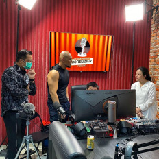 House of Representative Speaker Puan Maharani (right) appears on an episode of 'Close The Door', a popular podcast series run by Indonesian entertainer Deddy Corbuzier (second left), in this file photo from July.