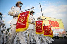 Future forward: A Chinese military band marches during a celebratory event in Beijing on July 1, 2021 to mark the 100th anniversary of the founding of the Communist Party of China. 