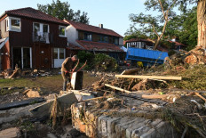 Germany picks through rubble after deadly floods sweep western Europe