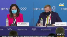 Queensland Premier Annastacia Palaszczuk (left) sits alongside John Coates (right), the head of the Australian Olympic Committee, during a press conference on July 22, 2021.