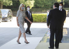 US First Lady Jill Biden (left) arrives at the Imperial Palace for a meeting with Japan's Emperor Naruhito in Tokyo on July 23, 2021, ahead of the opening ceremony for the 2020 Tokyo Olympic Games. 