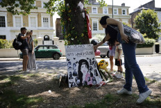 Fans honour Amy Winehouse in London decade after her death