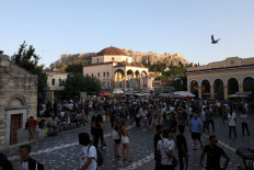 People visit Monastiraki square in Athens, Greece, July 25, 2021. Picture taken July 25, 2021.


