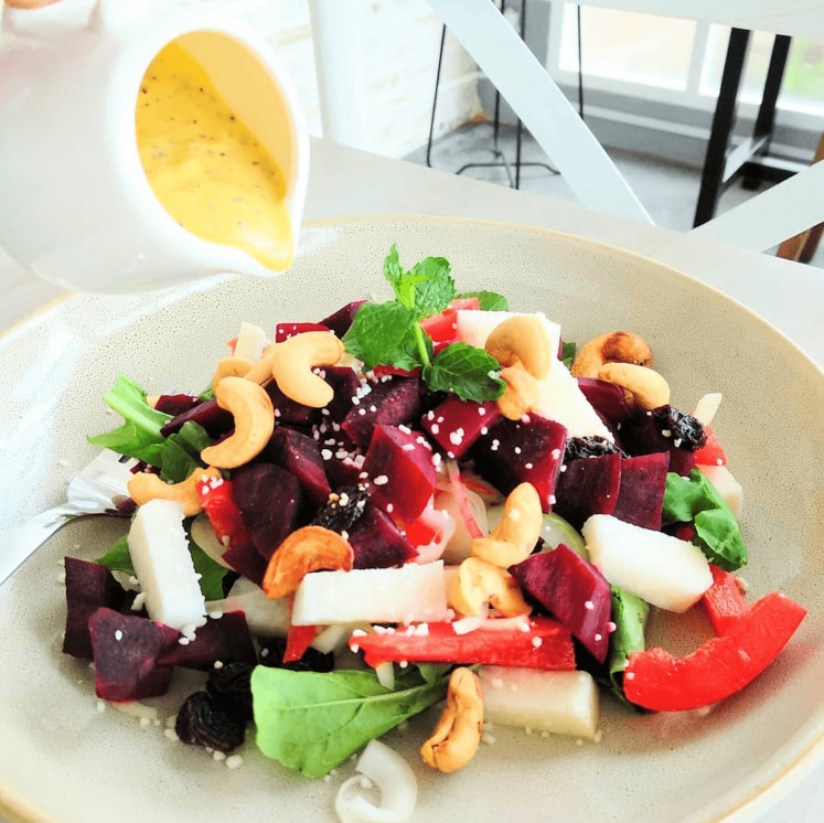 Crowd favorite: Tanasurga's signature Beetroot Salad is made from beetroot, bell pepper, cashew, arugula, onion, jicama, raisin and passion fruit topped with homemade passion fruit dressing.