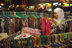 Batik seller works in a traditional market in Yogyakarta on Sept. 27, 2011.