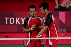 Indonesian pairs book Tokyo Games badminton semifinal spots
