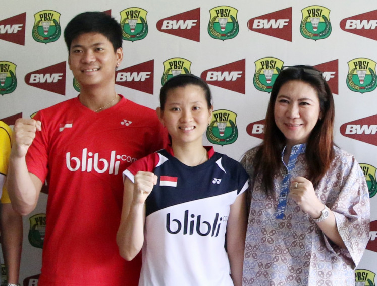 Every player's idol: Young badminton players like Praveen Jordan (left) and Debby Susanto (center) look up to Susy Susanti.