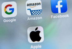 App icons of major US tech firms are displayed on a screen. Big Tech goliaths like Facebook and Amazon unveiled whopping profits this week.