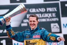 In this photo taken on August 27, 1995, German Benetton-Renault driver Michael Schumacher jubilates on the podium after winning the Formula One Grand-Prix of Belgium in Spa-Francorchamps. An upcoming documentary from Netflix will retrace Schumacher's life and career.
