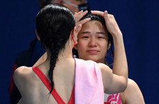 Chinese Olympic diving champion tells of depression struggle