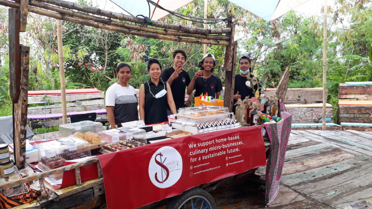 Micro businesses: Sendok Kreatif Bali Food Bazaar Bali 2021 with micro entrepreneurs Sherly (left) from Dapur Mama Ica, Catherine Muljadi (second left) from Apple & Co and the Three Brothers infused arak team.