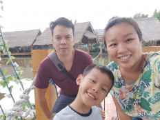 Happy moments: Marietta Ivena (right) lost her life to COVID-19 on July 11, leaving behind her husband Adi Chandra (left) and son Kennard Gladwin. Her unborn child did not survive and was later named Celine. 