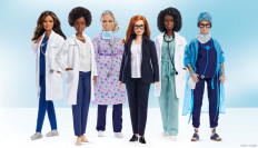 An undated handout image of a Barbie doll made in the likeness of Sarah Gilbert (3d R), the Oxford University professor who co-designed the Oxford/AstraZeneca vaccine, among a global lineup of women of healthcare sector honored with a one-of-a-kind doll. 


