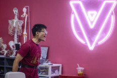 China's amateur weightlifters fight 'short, fat' stigma