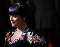 British singer Lily Allen poses as she arrives for the British premiere of Tamara Drew in Leicester Square, central London September 6, 2010. 

